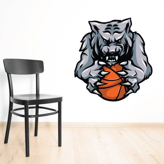 Basketball wolf mascot sticker, grey wolf holding orange basketball