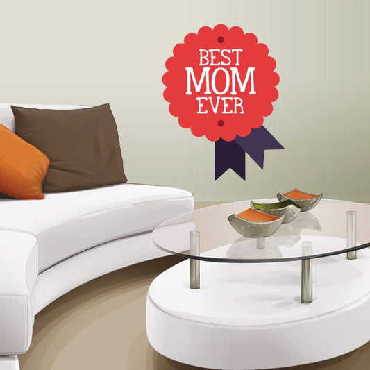 Red scalloped ribbon sticker reading 'BEST MOM EVER' with purple ribbon tails