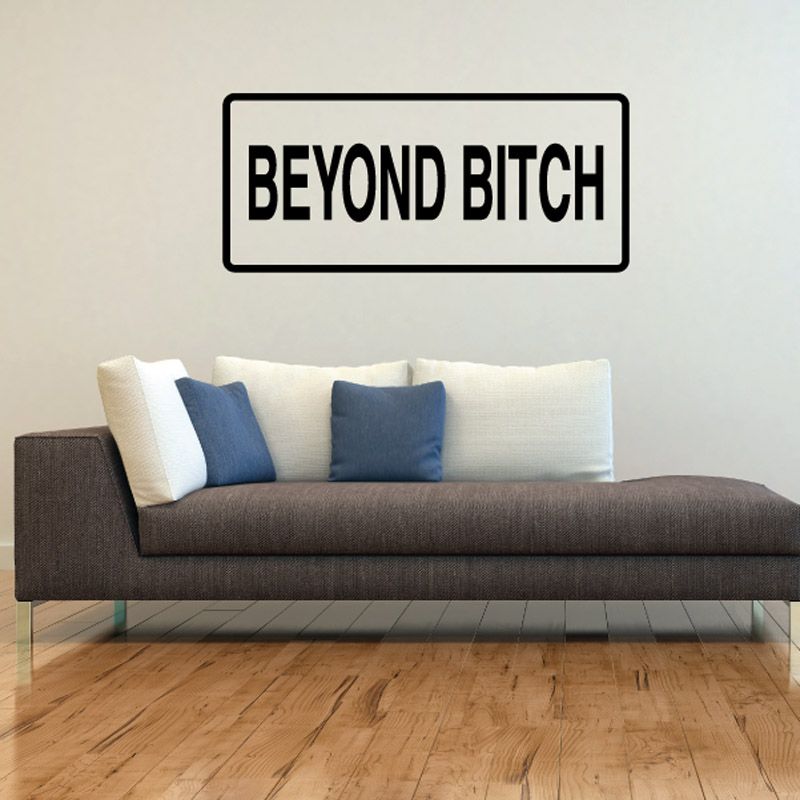 Wall text decal with 'BEYOND BITCH' in bold black letters on white