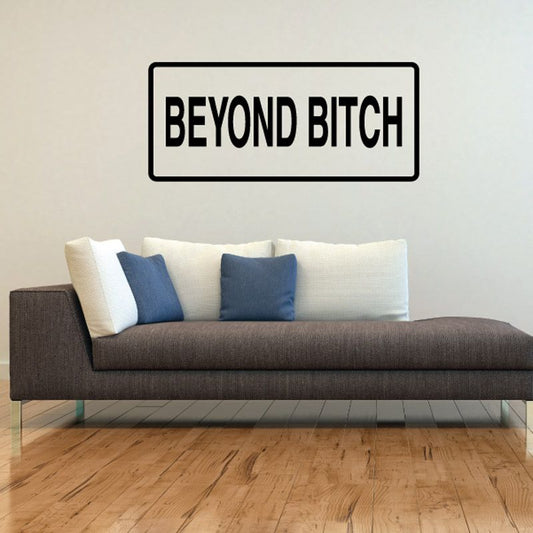 Wall text decal with 'BEYOND BITCH' in bold black letters on white