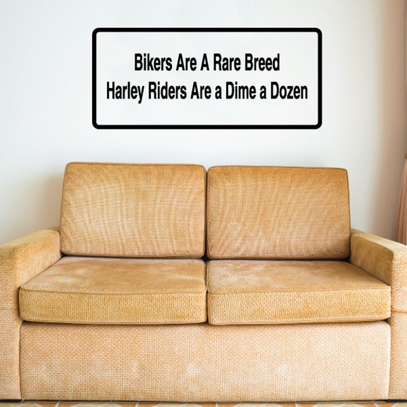 Rectangular wall decal with black border and bold biker quote text