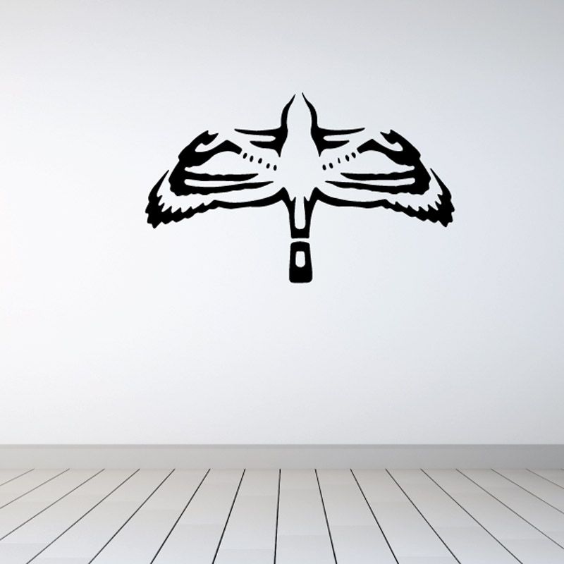 Black bird wall decal with white striping on spread wings