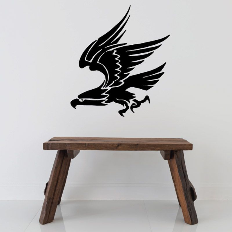 Black bird vinyl wall decal with wings spread and tail feathers.