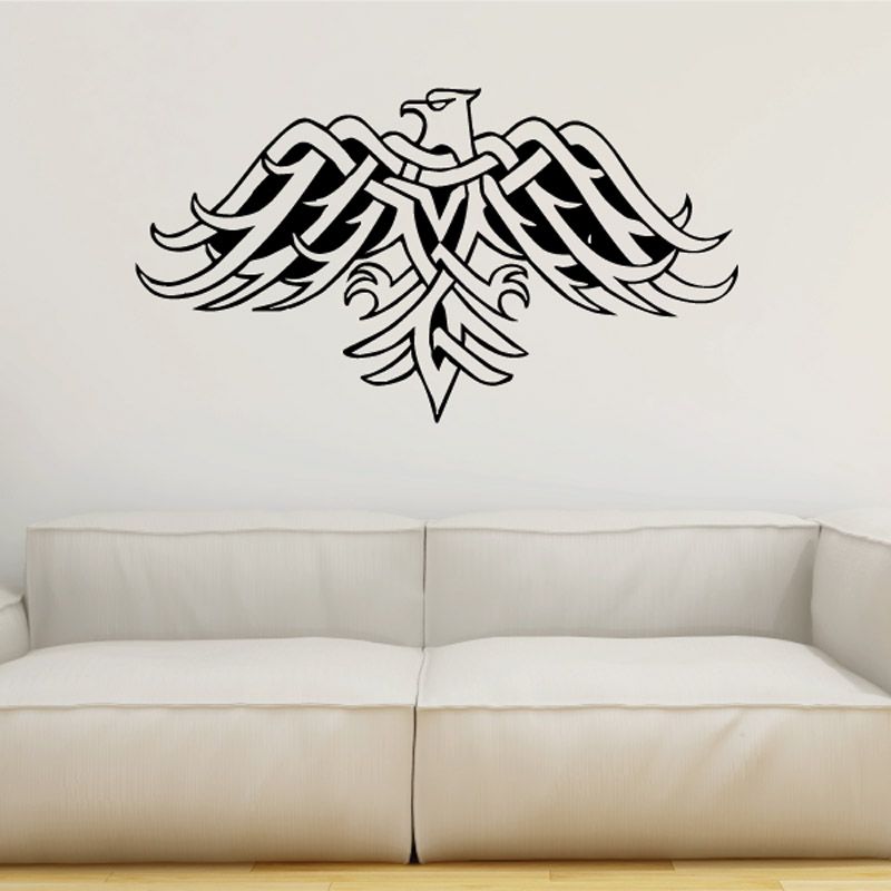 Black tribal bird vinyl wall decal with wings spread and ornate tail