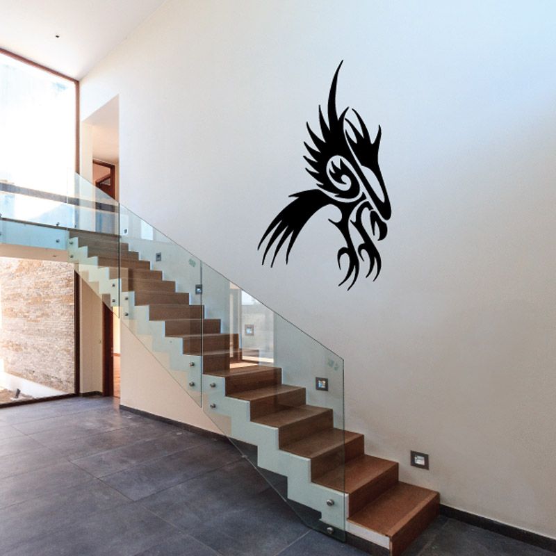 Bird wall decal, black tribal-style bird head with bold linework on wall