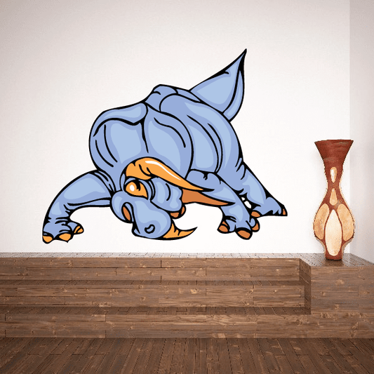 Blocking triceratops sticker, light blue cartoon dinosaur with orange details
