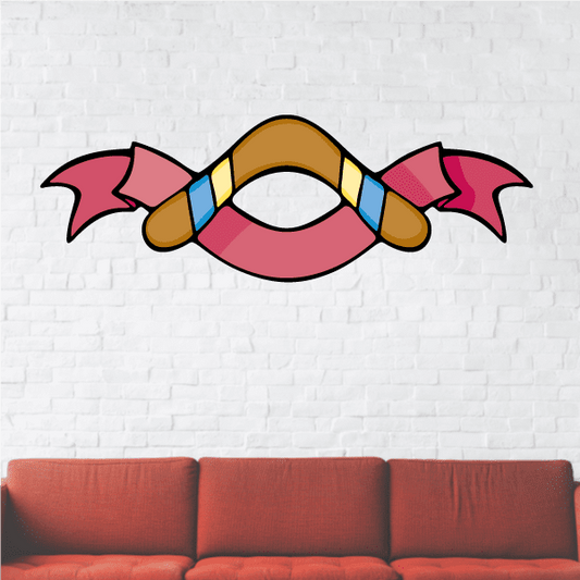 Blue and brown boomerang sticker with pink center and rounded tail ends