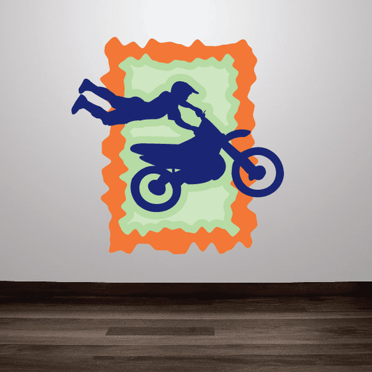 Dirt bike sticker with blue bike on orange-and-green jagged border