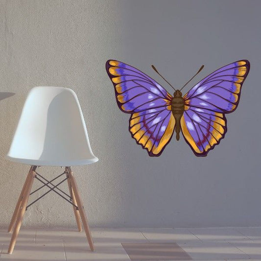 Blue and yellow butterfly wall decal with wings spread