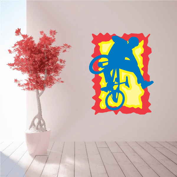 BMX bike trick decal with blue, yellow, and red bicycle rider graphic