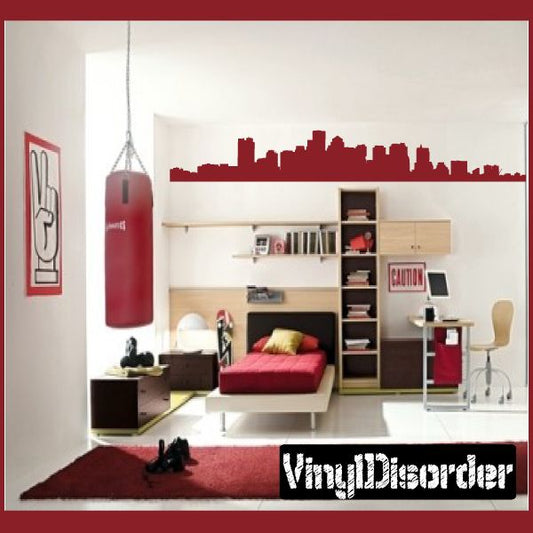 Red Boston skyline wall decal with city silhouette along top of wall