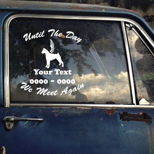Car window memorial decal with winged dog silhouette and 'We Meet Again' text