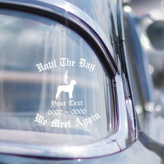 Memorial decal with angel silhouette and quote on car window