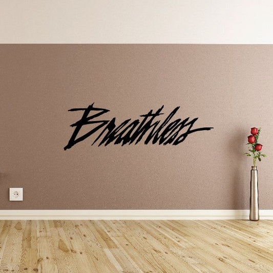 Breathless wall decal with black cursive lettering