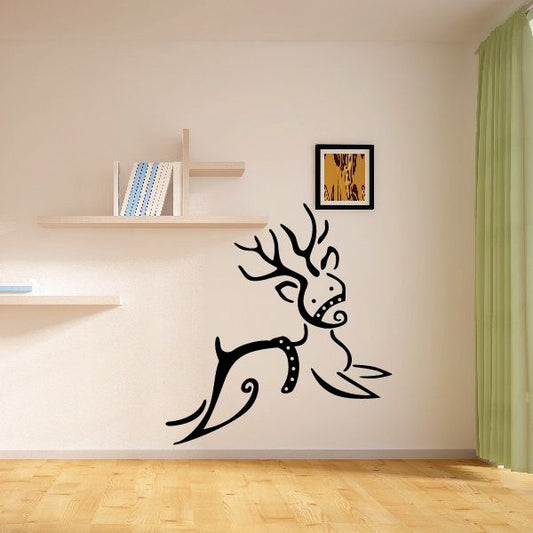 Brush style reindeer decal, black outline with antlers and bow