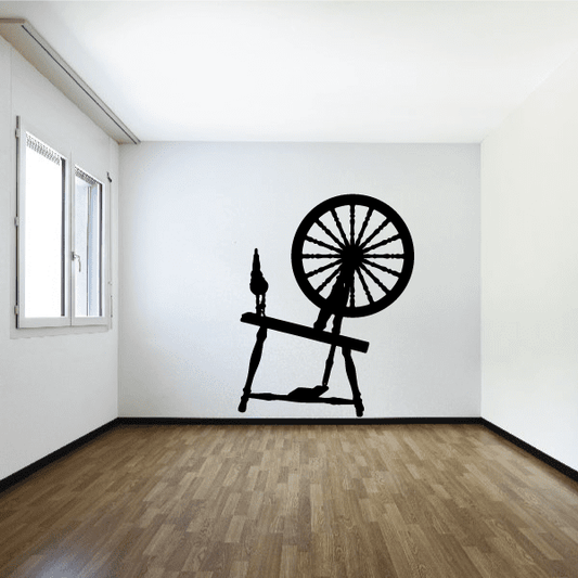 Black vintage cannon wall decal with large wheel and barrel silhouette
