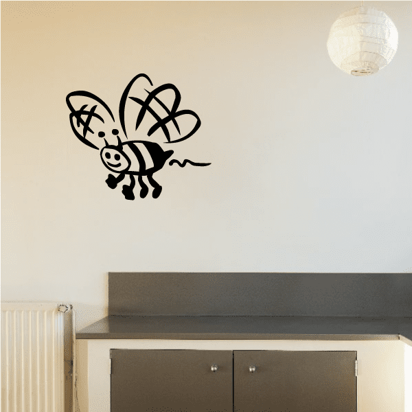 Black buzzing bumble bee wall decal with open wings, antennae, and motion lines