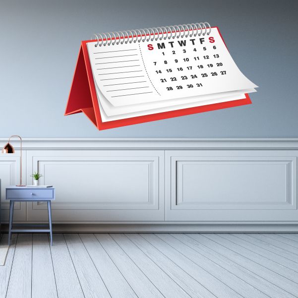 Calendar month wall decal with weekday headers and monthly date grid on white paper