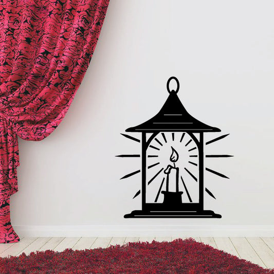 Black lantern candle wall decal with flame and radiating lines