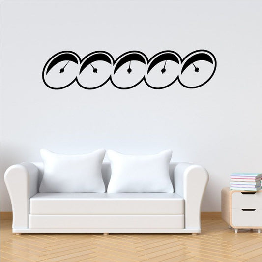 Vinyl gauge decal with five black-outlined circles and center dots