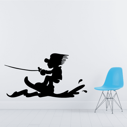 Cartoon wakeboarder decal sticker, black silhouette of rider holding rope handle.