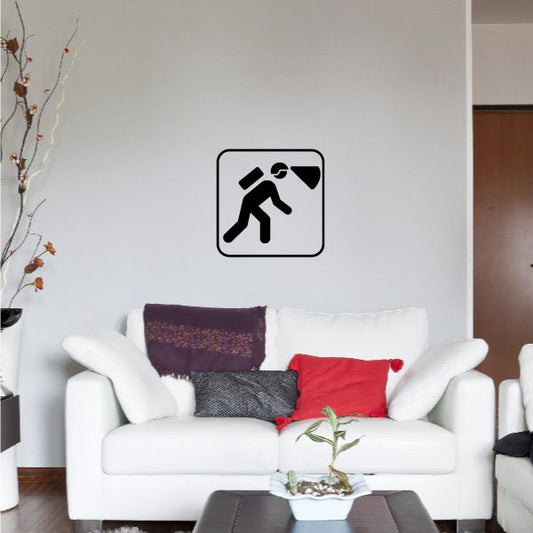 Hiker with headlight decal, black icon on light wall