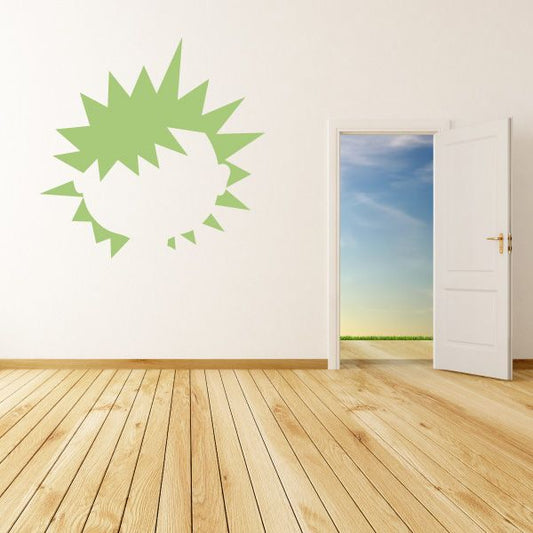 Green spiky characterface wall decal with white face silhouette