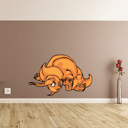 Charging triceratops sticker, orange cartoon dinosaur with raised horns
