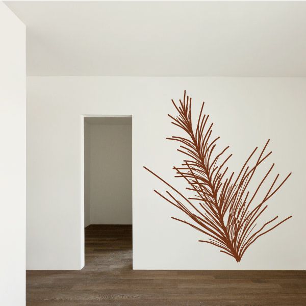 Long pine branch wall decal with brown needle clusters