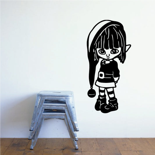 Christmas Elf Decal depicting a girl dressed in festive black and white attire