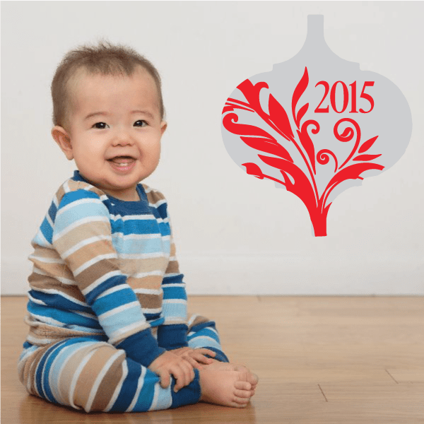 Red floral ornament sticker with 2015 on white hanging-bell shape