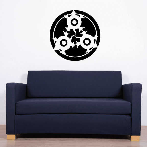 Round black turtle decal with floral and shell-like pattern