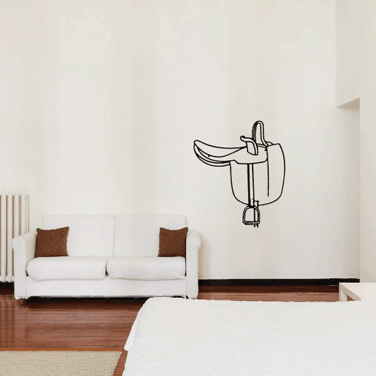 Horse saddle wall decal with outlined black saddle and girth details