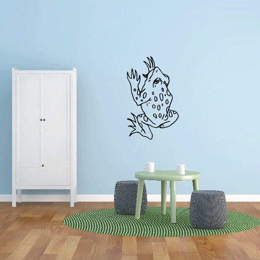 Cartoon climbing frog wall decal, black line art on white background