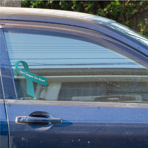 Awareness ribbon vinyl sticker with teal ribbon on car window