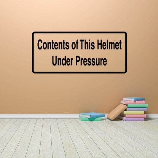 Helmet warning decal with black border and text 'Contents of This Helmet Under Pressure'