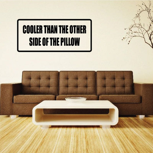 Wall decal text “COOLER THAN THE OTHER SIDE OF THE PILLOW” in black