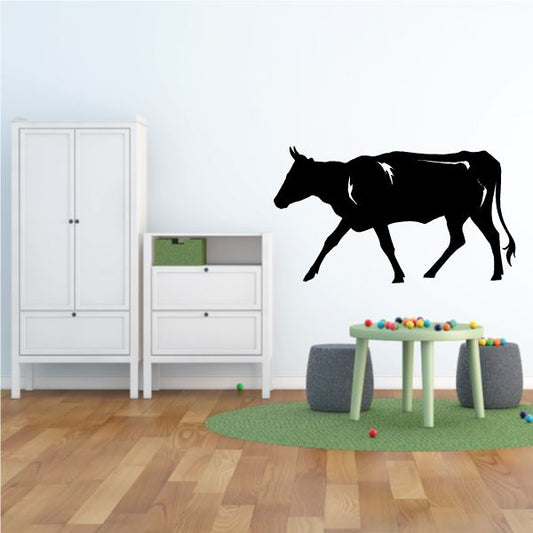 Cow trotting decal, black silhouette