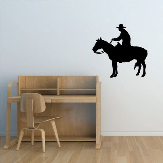 Black cowboy on horse watching vinyl wall decal silhouette