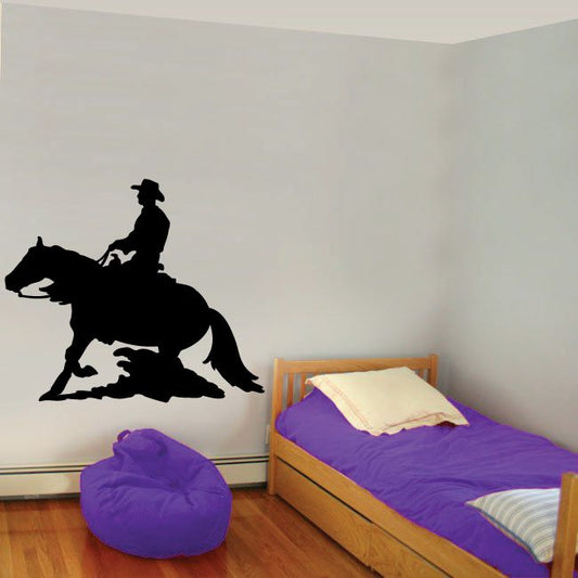 Black cowboy riding a charging horse wall decal