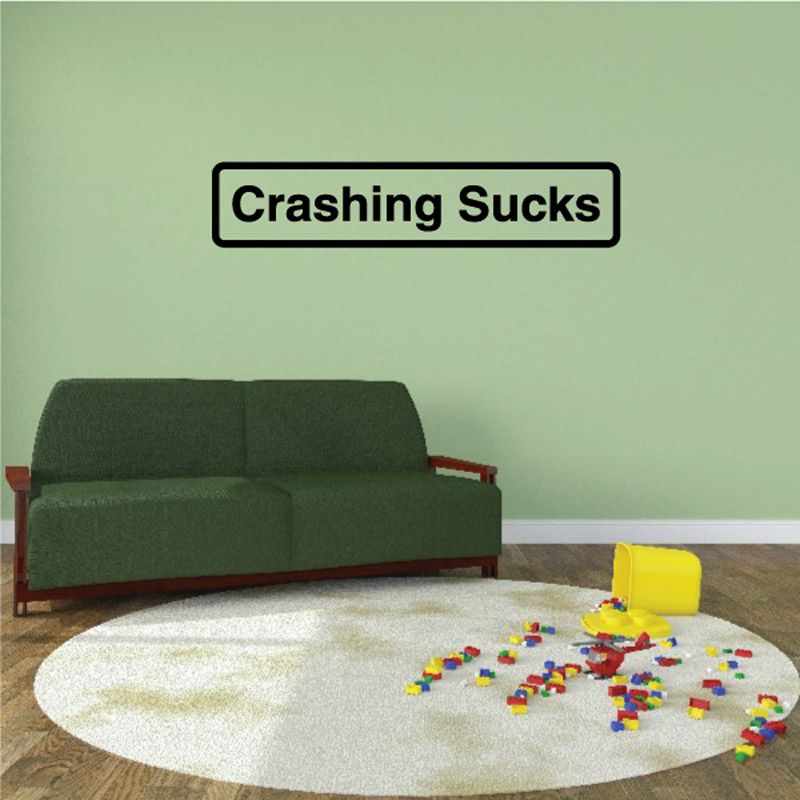 Vinyl decal with bold black text “Crashing Sucks”