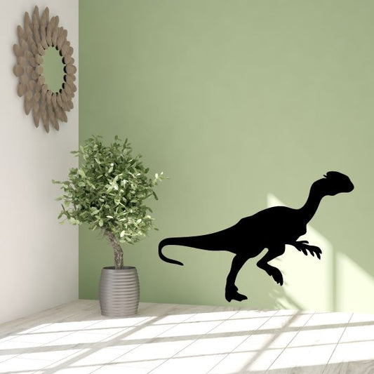 Creeping Dilophosaurus wall decal, black dinosaur silhouette with open mouth and frill