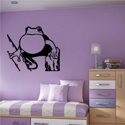 Croaking frog on tree wall decal, black