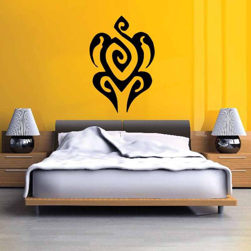 Black abstract cross and turtle wall decal with ornate swirling design