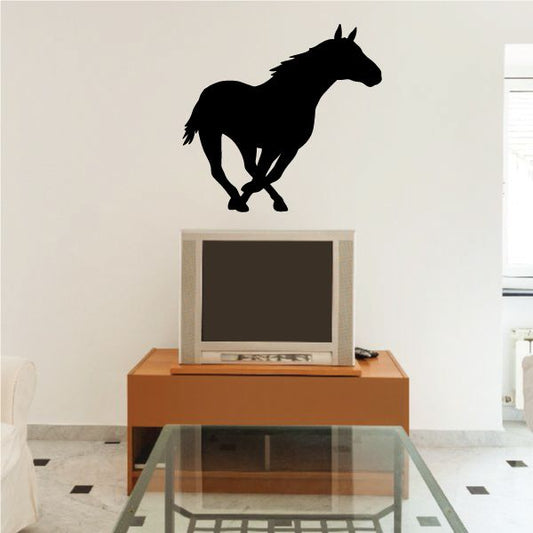 Black running horse wall decal silhouette on light background