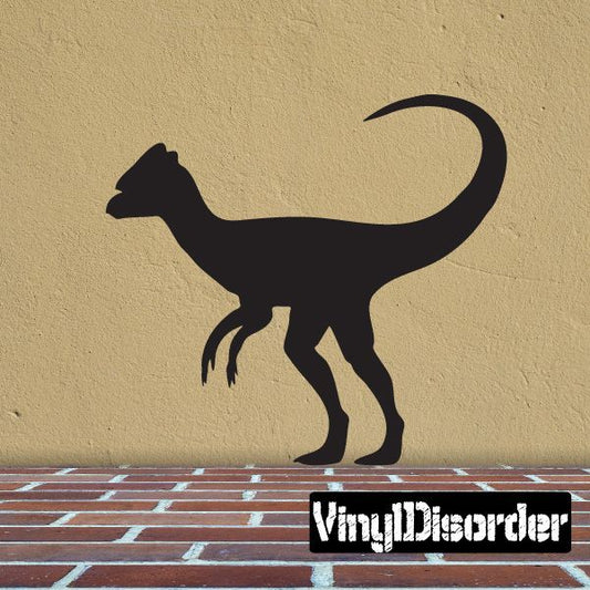 Dark dinosaur silhouette wall decal of a standing Dilophosaurus with open jaw