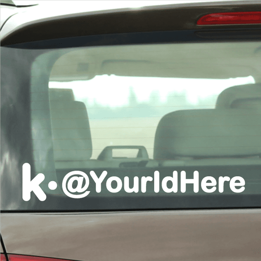 White die-cut decal text 'k.@yourIdHere' on car window
