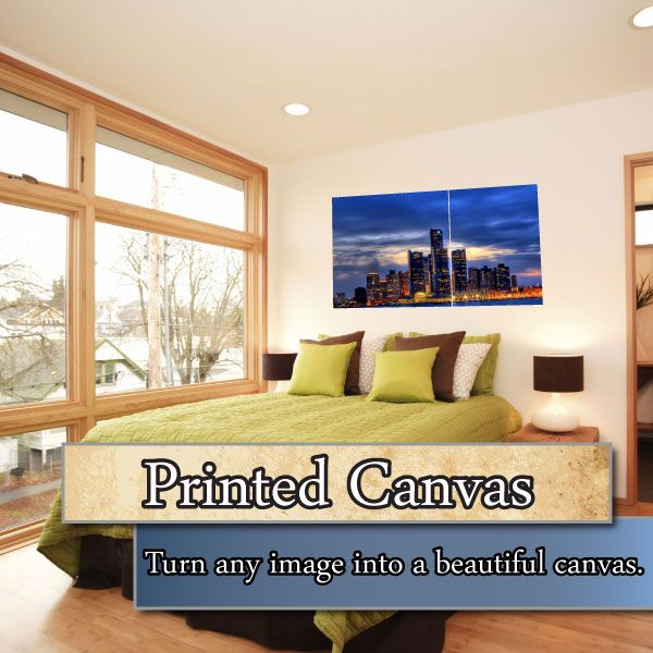 Canvas wall art with city skyline print under blue night sky.