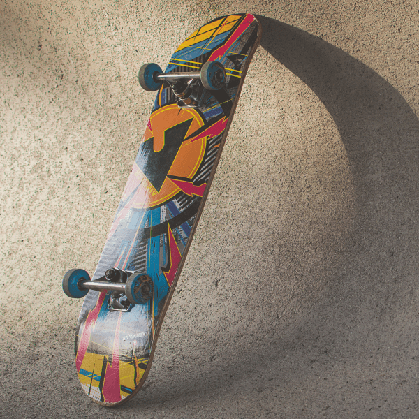 Vinyl skateboard wrap with colorful abstract graphic deck