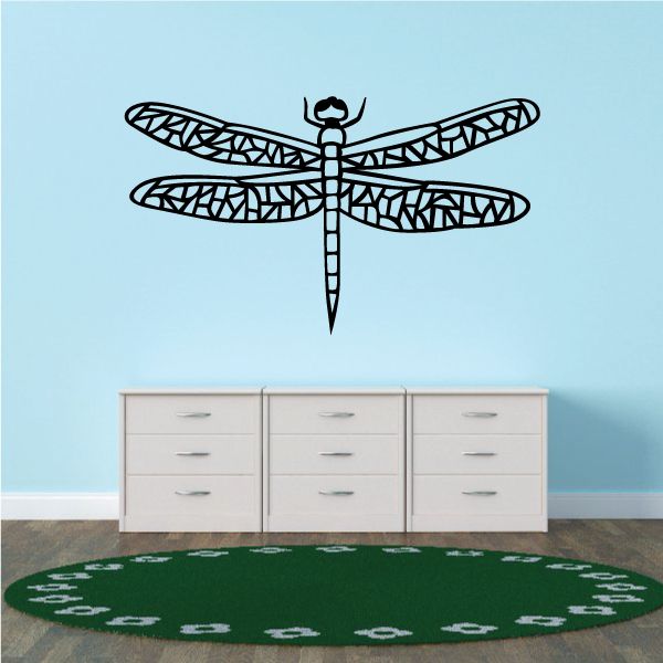 Dragonfly decal with cut-out wing pattern, black design